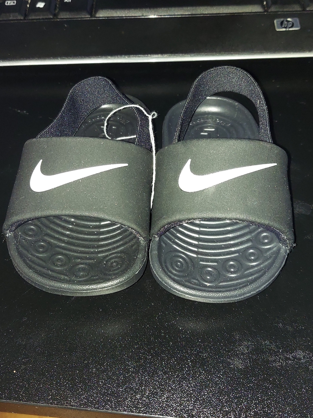 Nike Kids Black Slide Sandals with White Swoosh